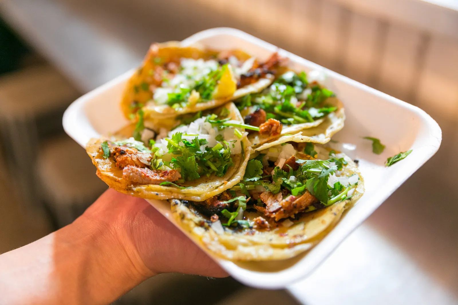 Al pastor tacos from El Flaco in Puerto Vallarta, Mexico; the photo does not show a Huntersville restaurant.