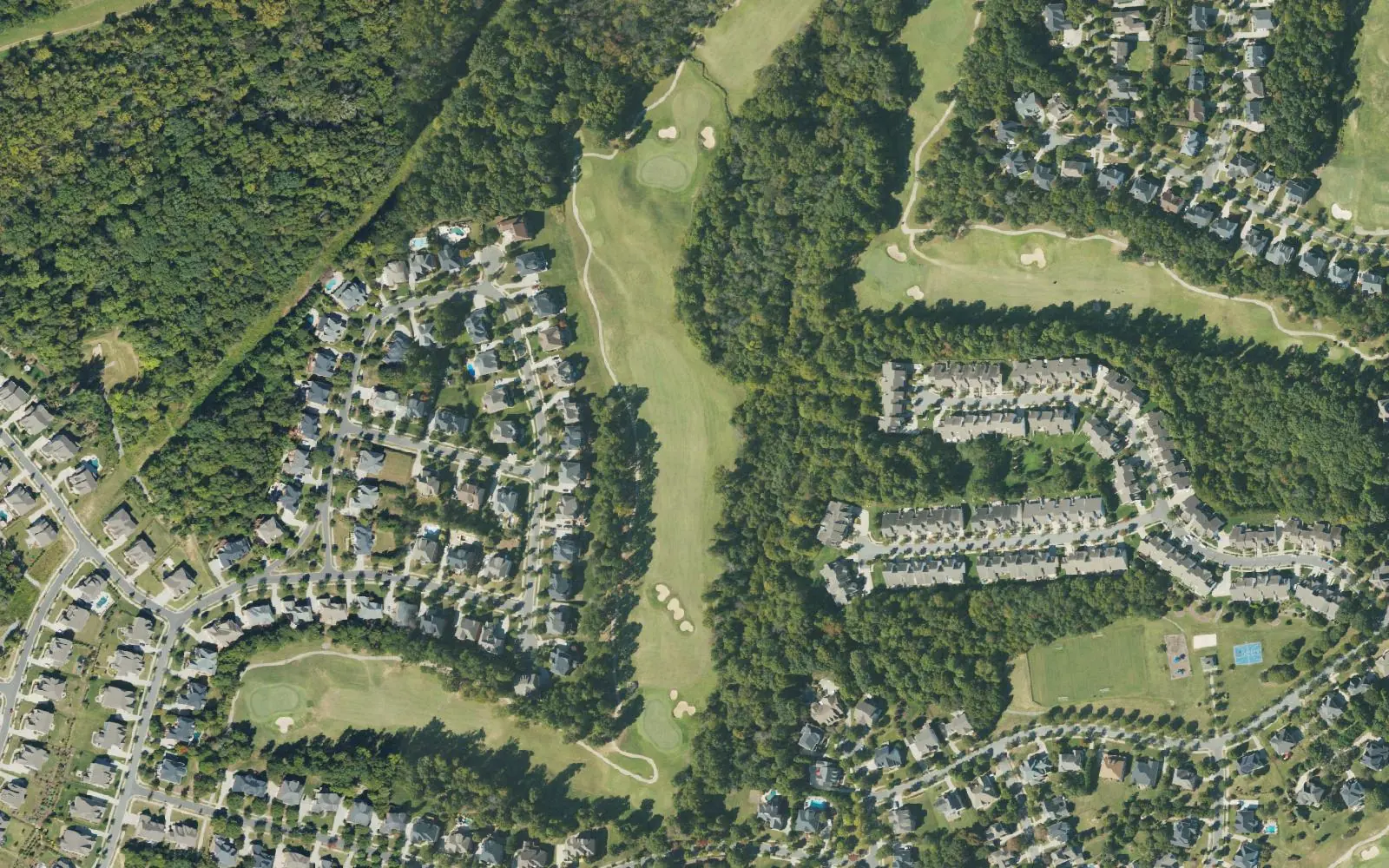 Homes and golf fairways south of Huntersville-Concord Road in east Huntersville, seen from the air