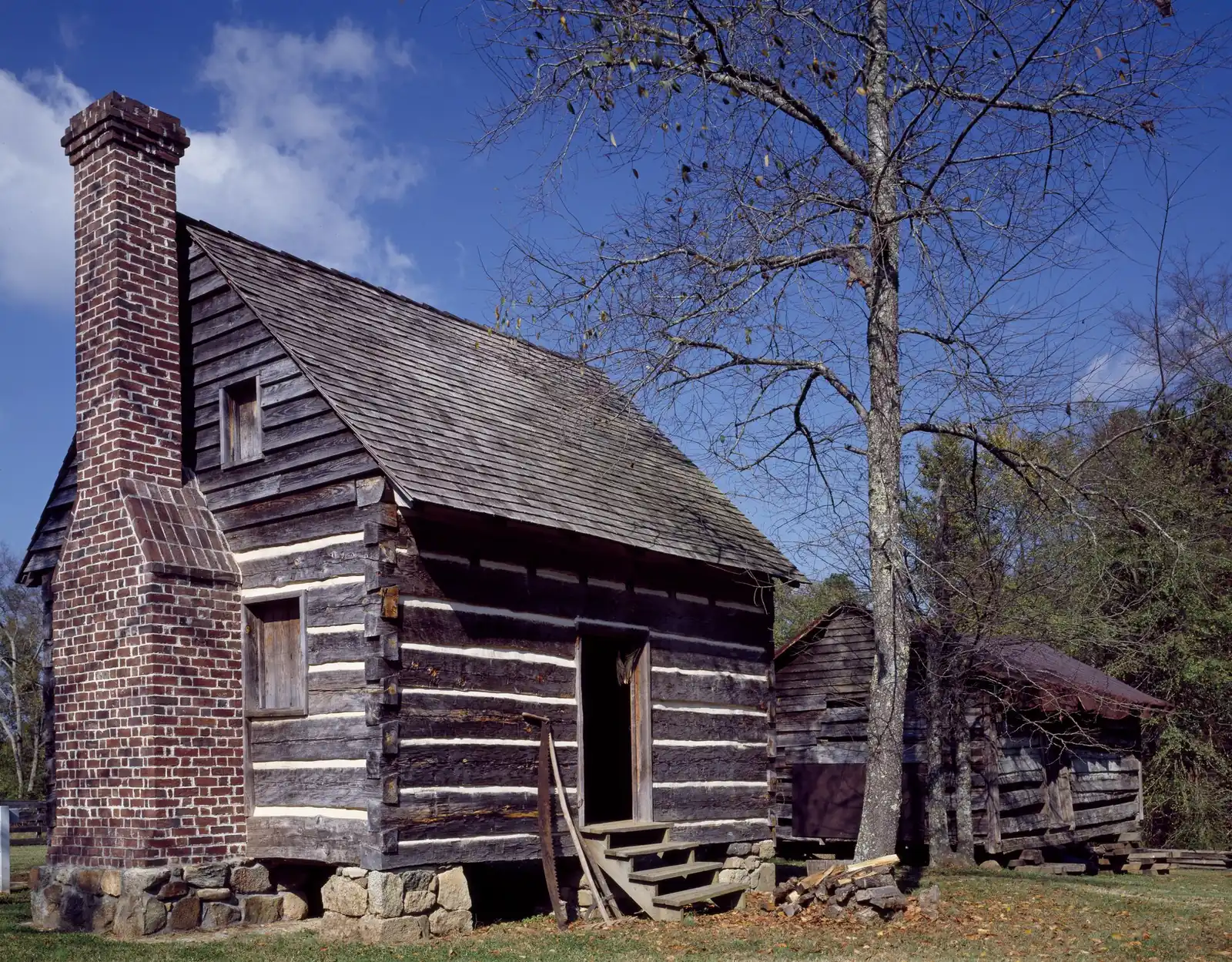 Log outbuildings at the Latta Plantation historic site in Latta Nature Preserve, Huntersville