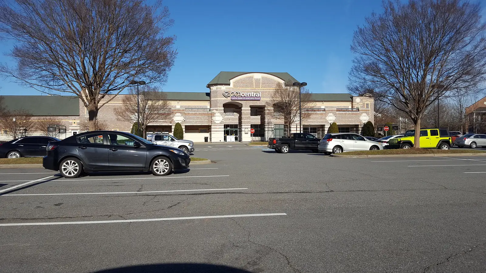 Storefronts at the Shops at Eastfield Village, anchored by Lowes Foods, in Huntersville