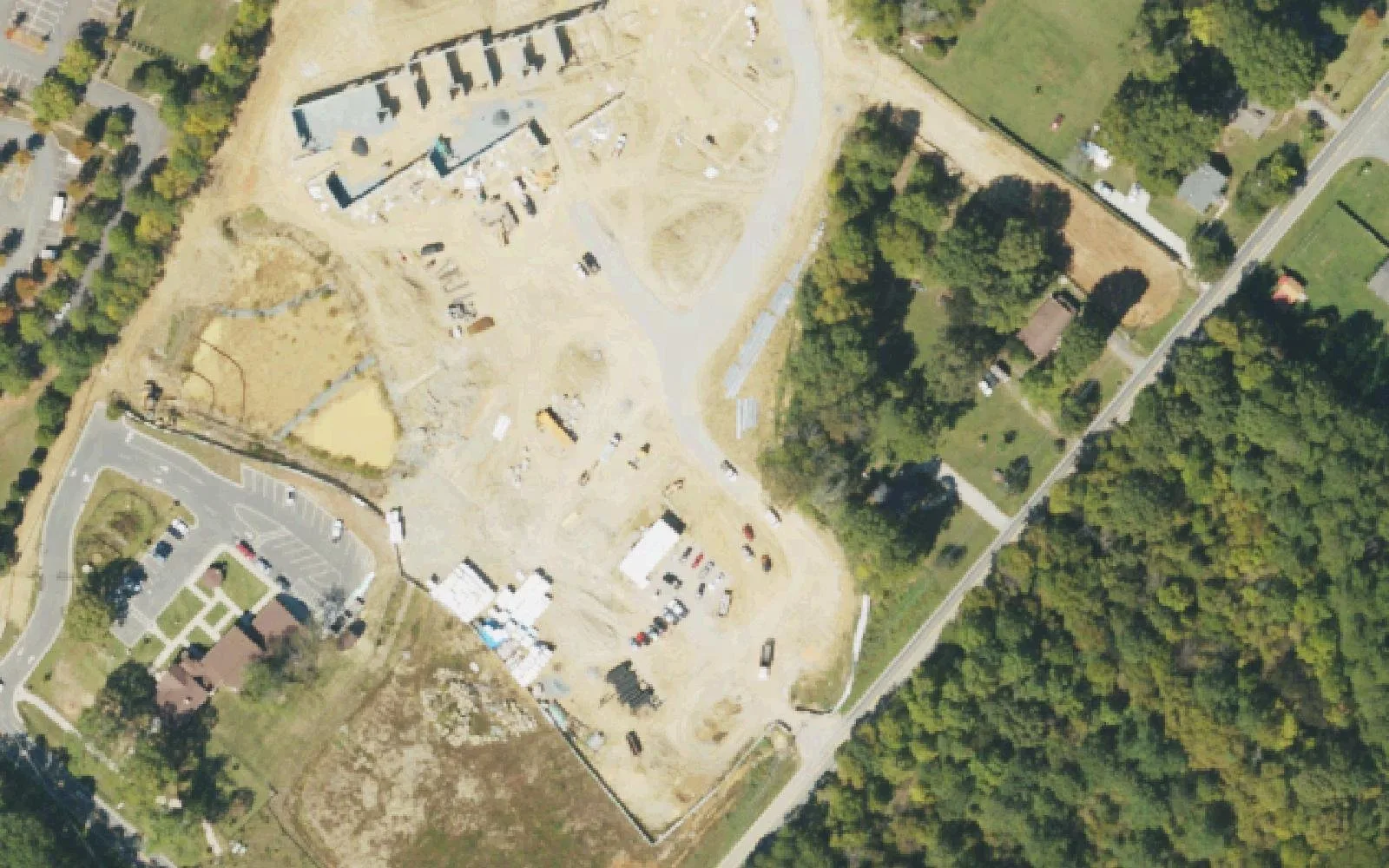 Construction at 7125 Hambright Road in Huntersville, Aspire Trade High School's address, beside Hopewell High's parking lots, seen from the air