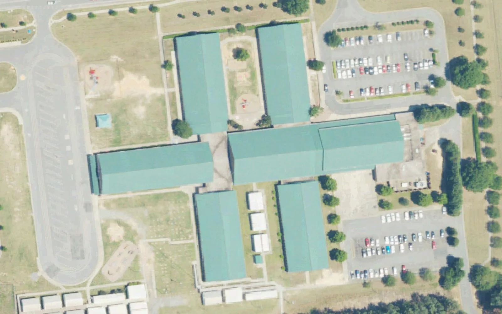 Blythe Elementary School's cross-shaped building and parking lots on Hambright Road in south Huntersville, seen from the air