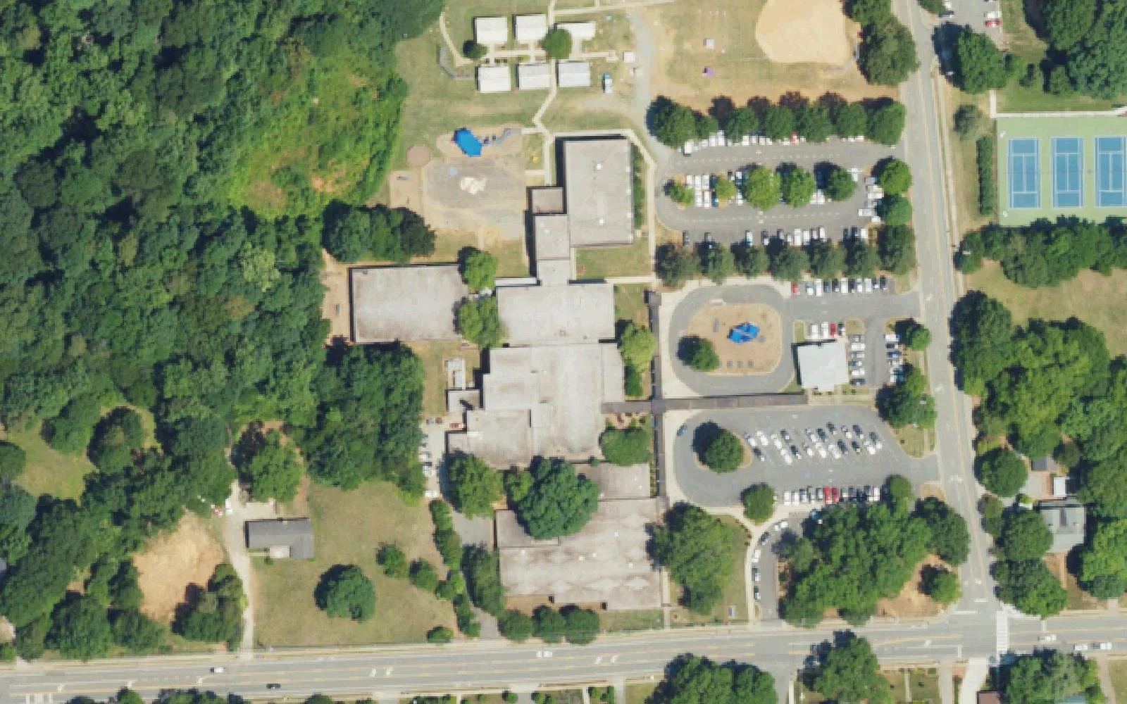 Huntersville Elementary School, its playground and its parking lots off Gilead Road near downtown Huntersville, seen from the air