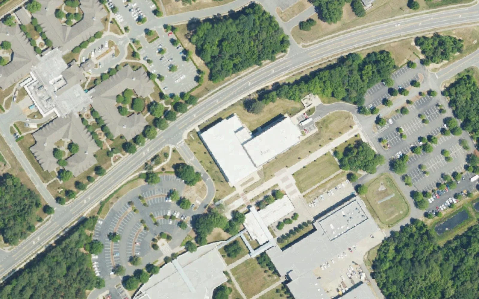 Buildings and parking lots of Central Piedmont Community College's Merancas Campus off Verhoeff Drive in Huntersville, seen from the air