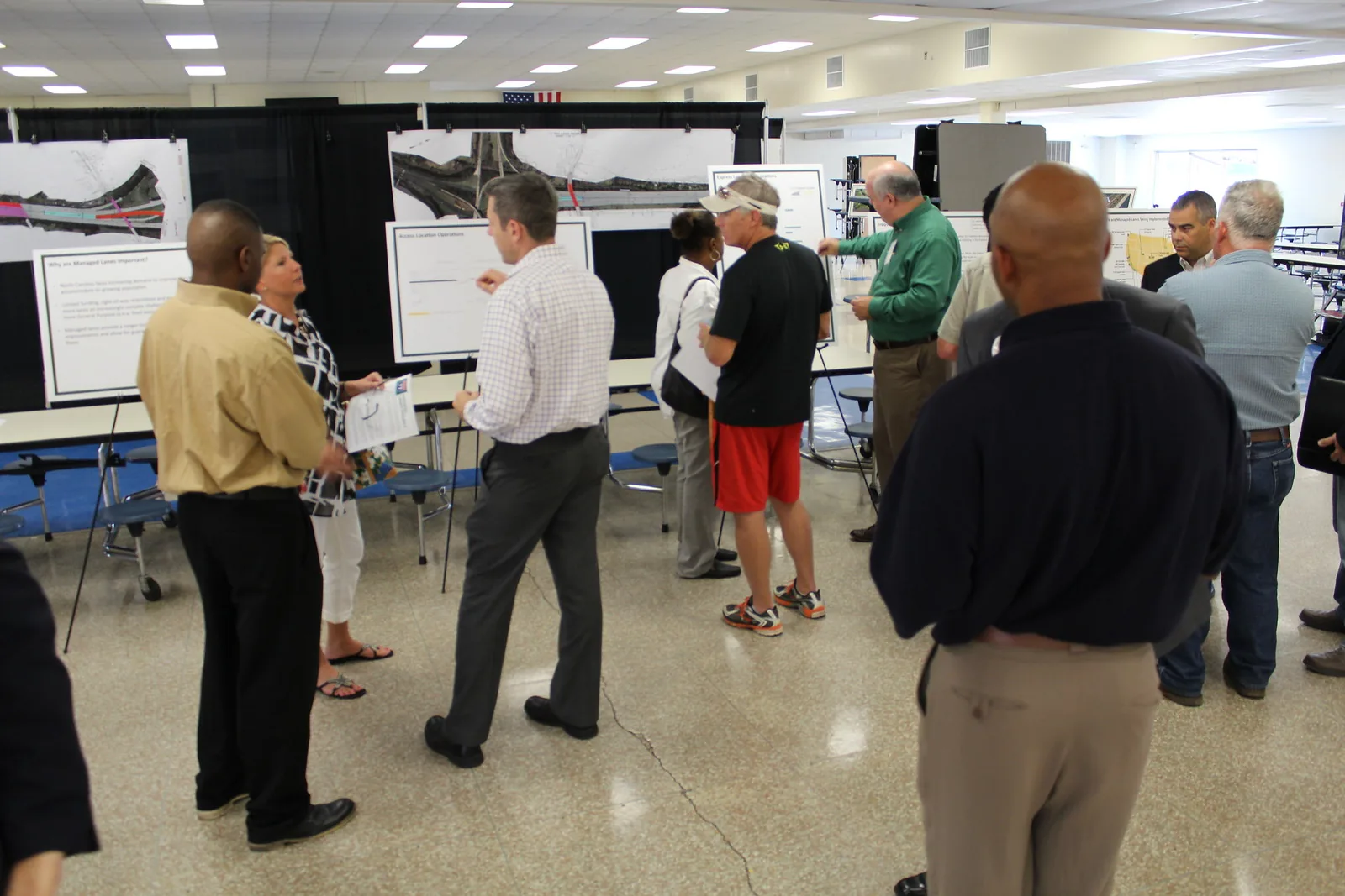 The cafeteria of North Mecklenburg High School in Huntersville, set up for a state transportation open house