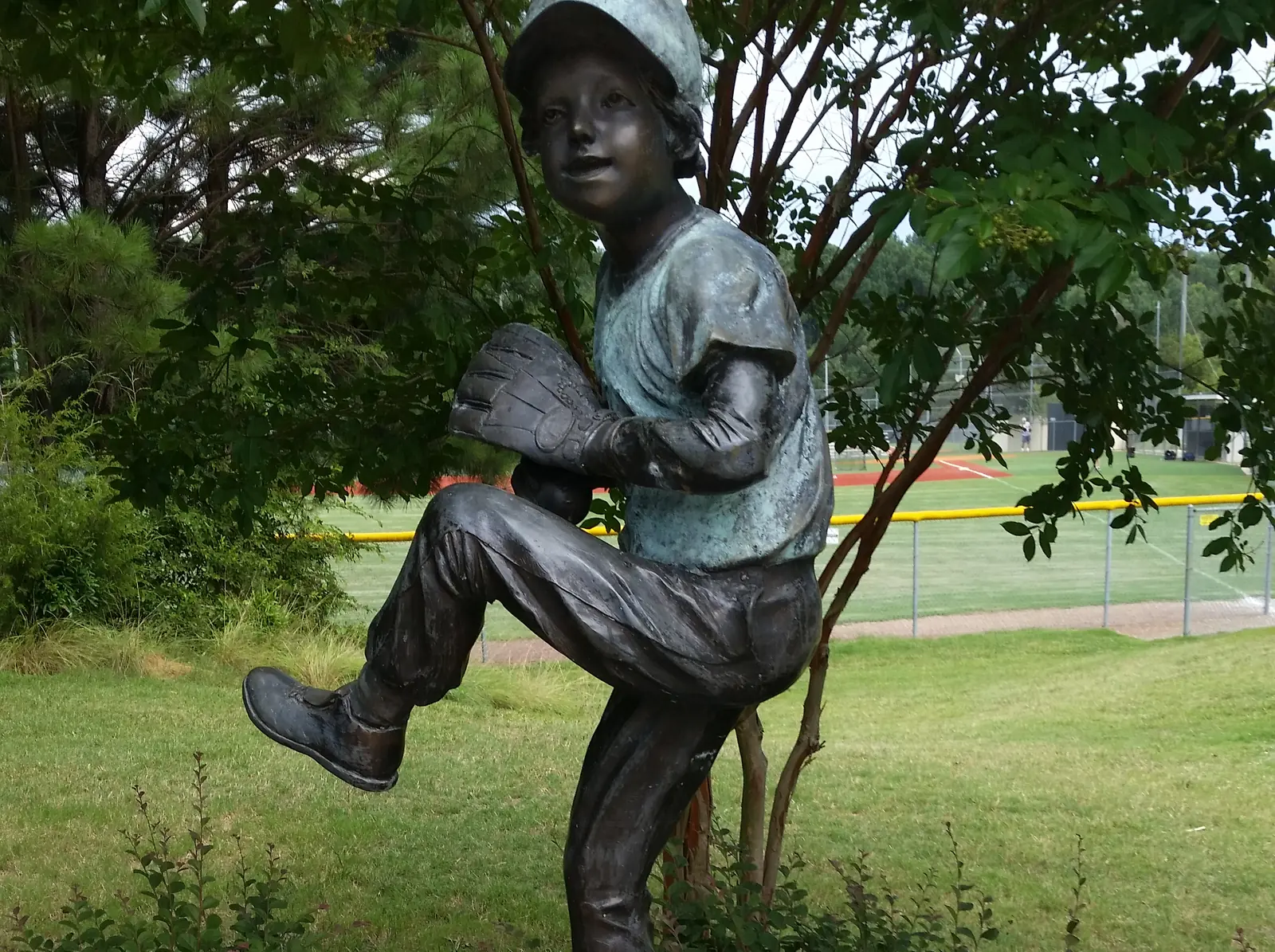 The James Hoyt Wilhelm commemorative statue beside the ballfields at Huntersville Athletic Park, where Halloween in Huntersville is held
