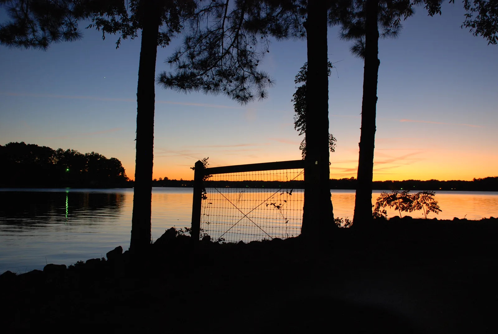 The sun sets over Lake Norman, on Huntersville's west side.